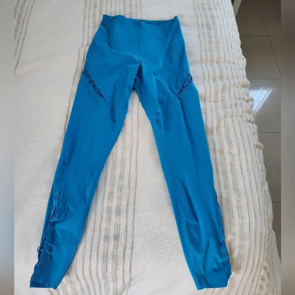 NIKE Dri fit Bungee Detail workout leggings In Aqua Blue XS